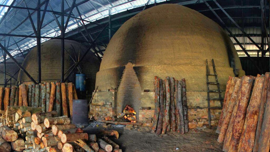 Witness traditional charcoal-making process at Kuala Sepetang Charcoal Factory